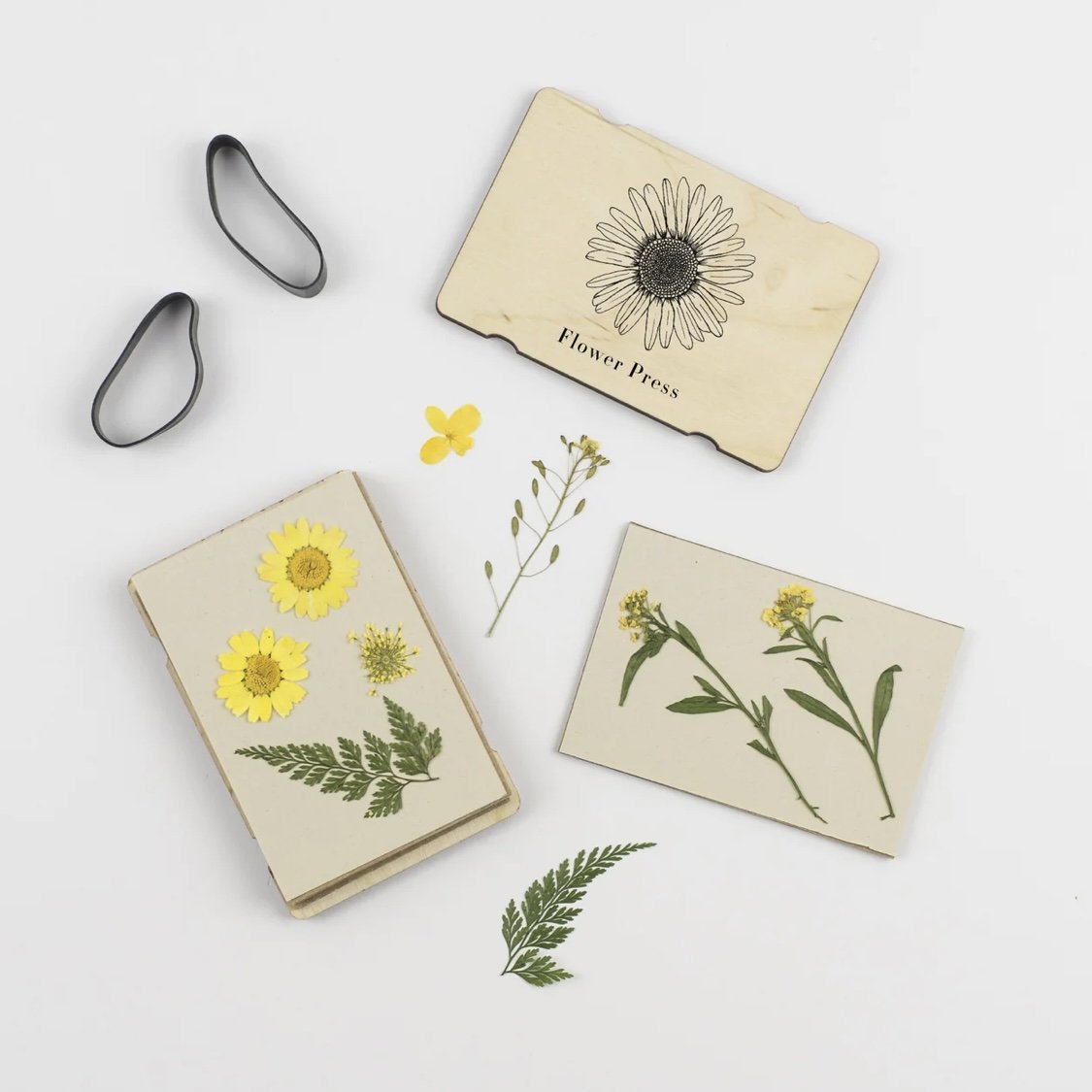 Blomsterpresse i lommeformat